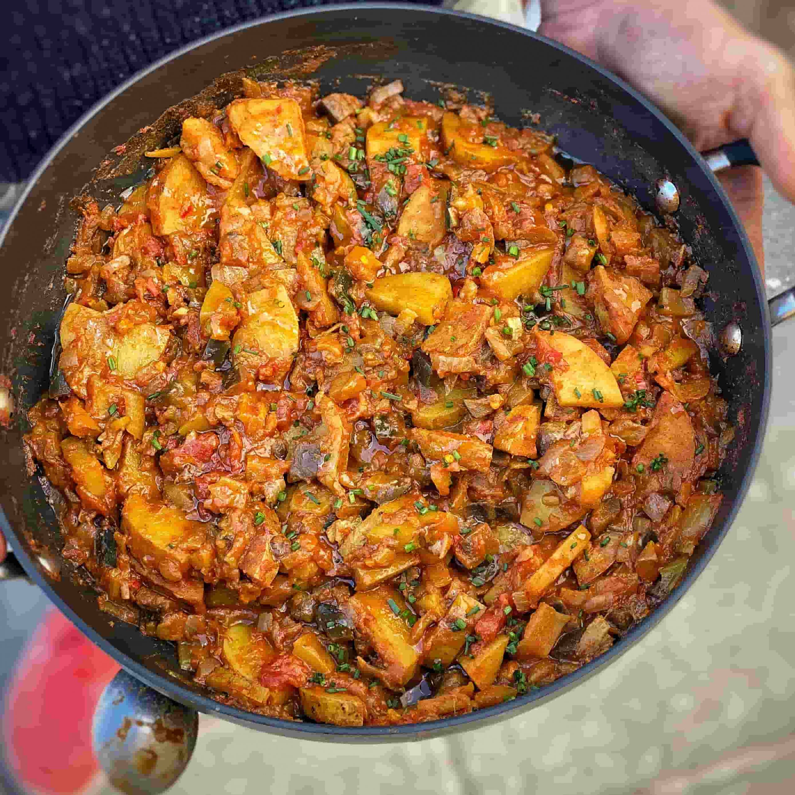 An image of Vegan Bombay potato and tomato curry