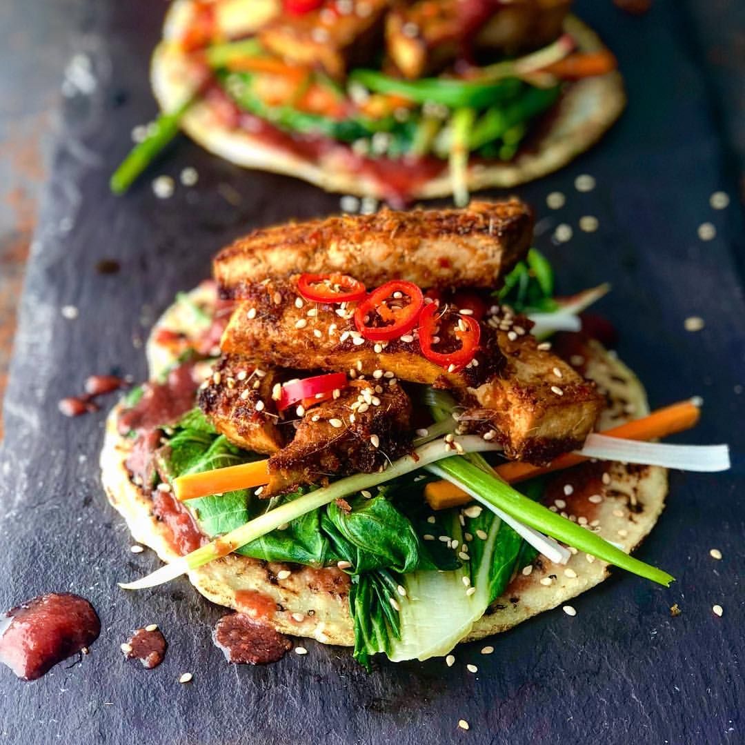 An image of crispy teriyaki tofu with a chinese plum sauce