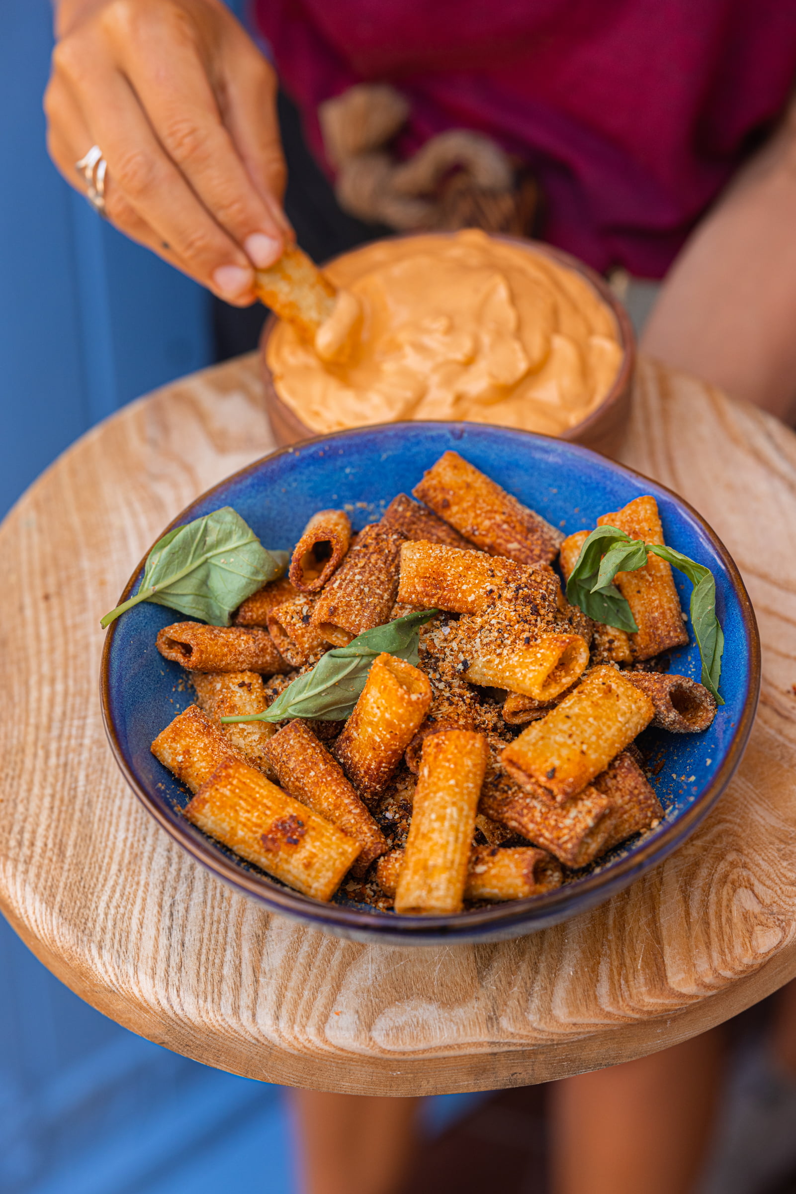 An image of Crispy Pasta Chips and Roasted Red Pepper Dip