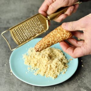 An image of a bowl of Tempeh Parmesan