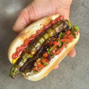 a photo of Spicy Spiral Courgette Hot Dog (Zucchini)