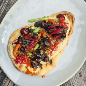 a photo of Mushroom Shawarma with Caramelised Apricot Salsa