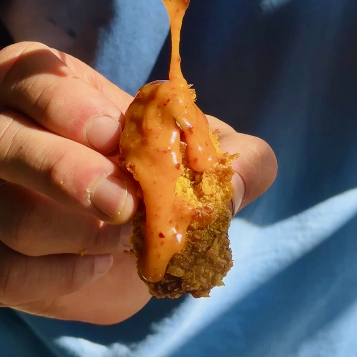 a photo of Cornflake-Crusted Tofu Tenders with Smoky Buffalo Glaze